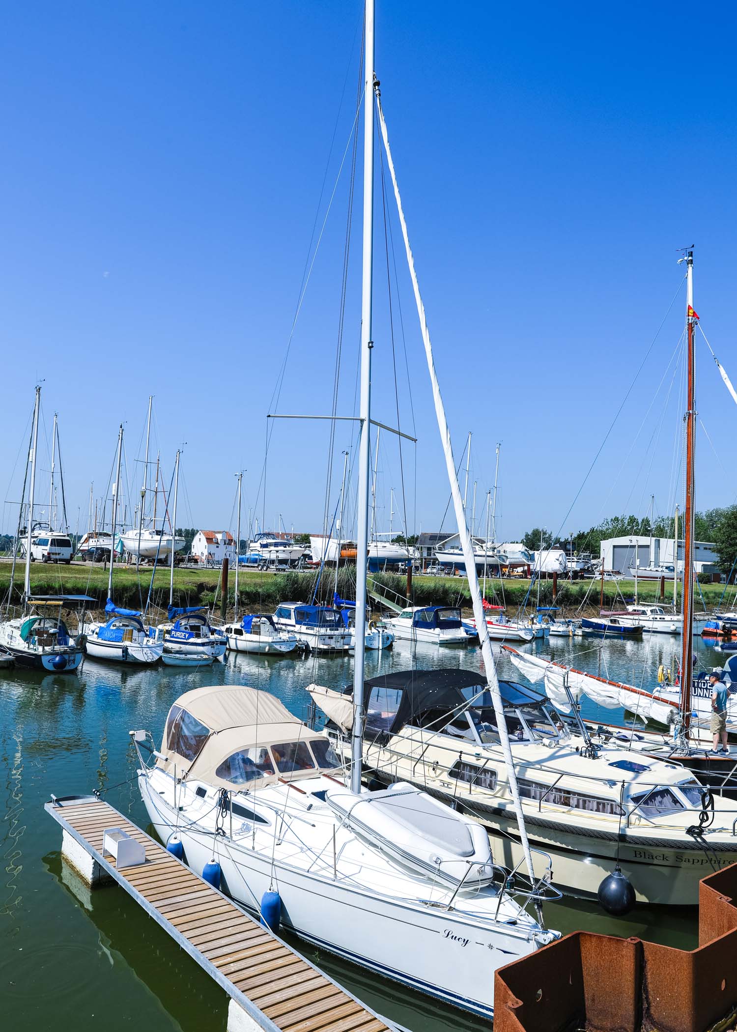 Yachts and boats at woodbridge marina on a wedding day in Woodbridge captured by Suffolk Wedding Photographer Hayley Denston Photography
